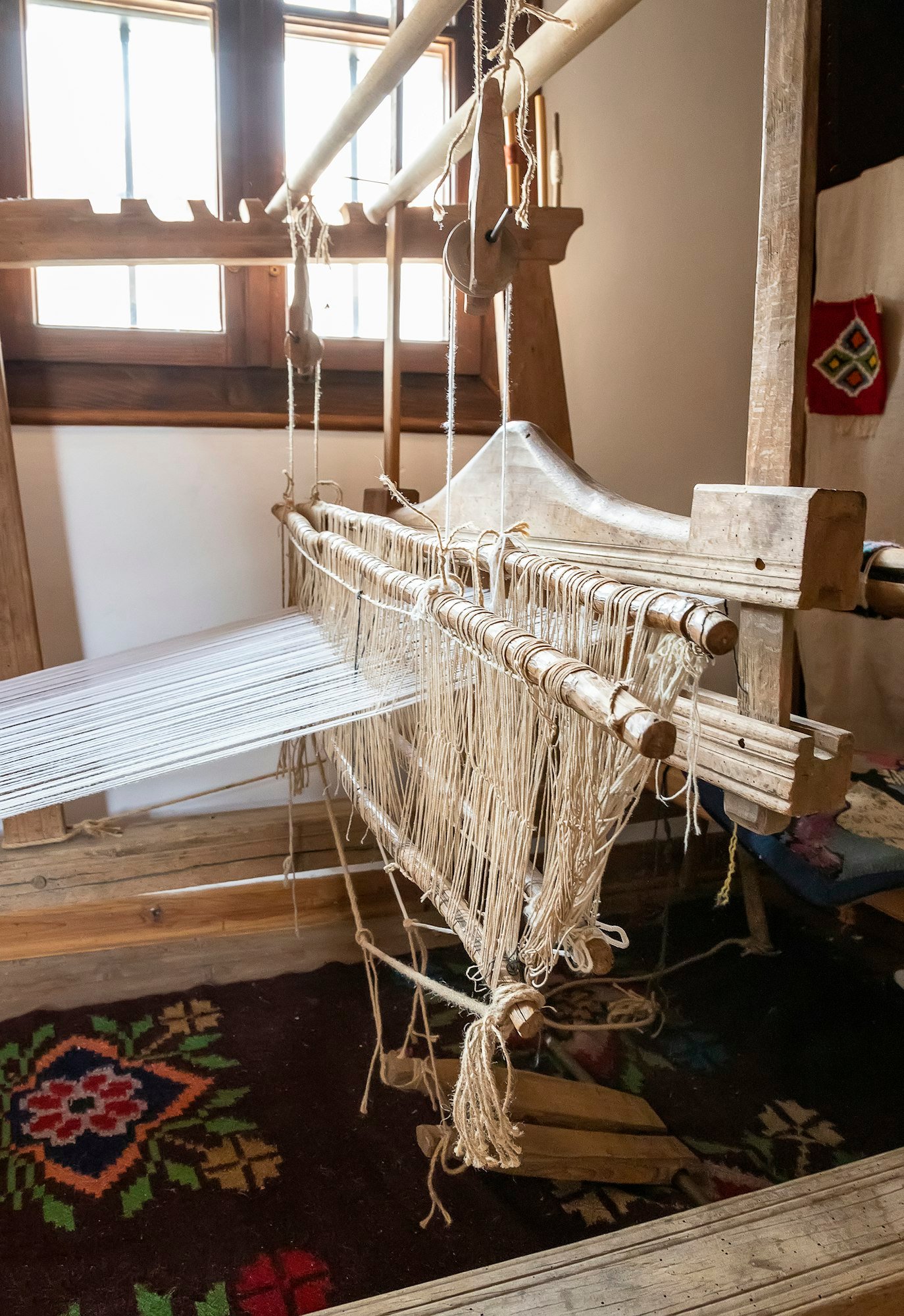 Master weaver working on a traditional loom